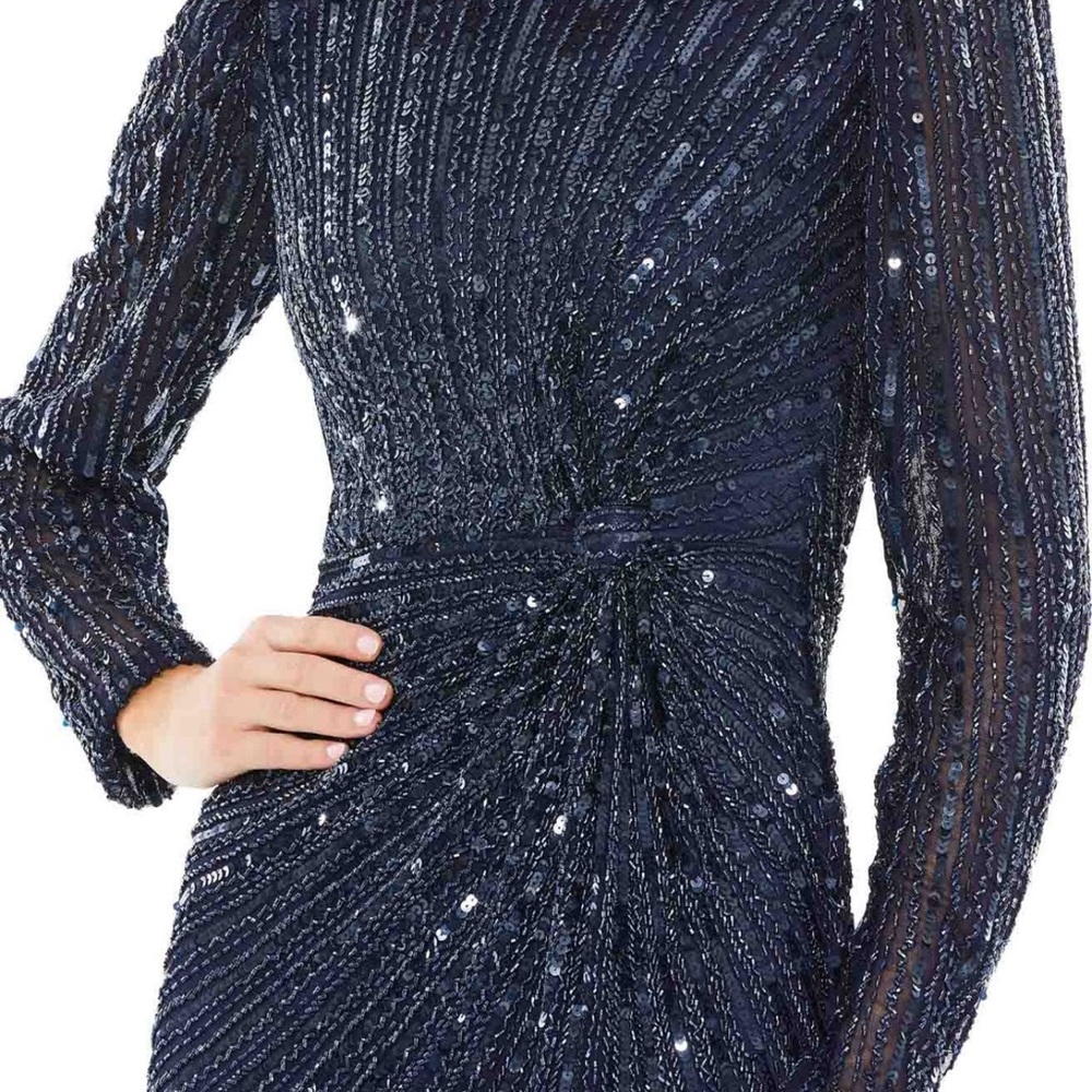 Heavily embellished .. gorgeous macduggal dress…
